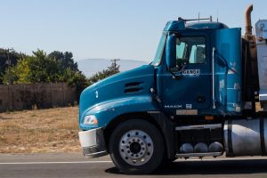 Dump Truck Runs Red Light, Injures Three on Rte 520